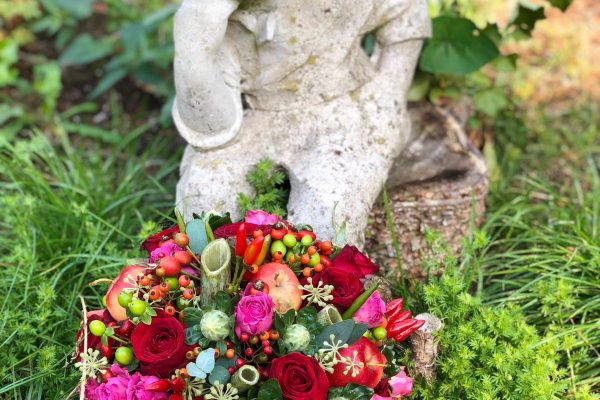 Bloemstuk met beeld FlowersRme